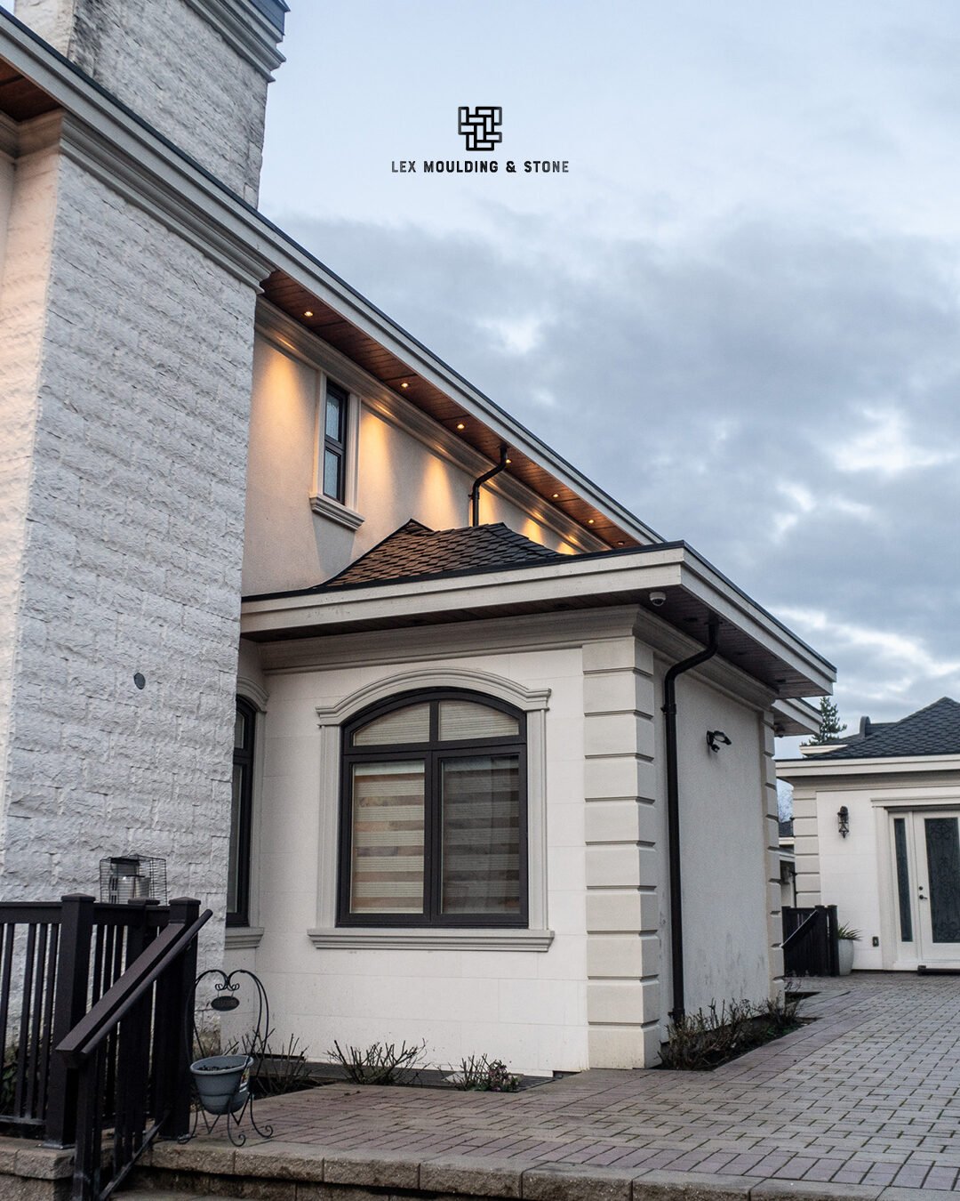 Custom home exterior with stone and trim